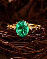 JADE Moissanite Accented Oval Cut Emerald Engagement Ring